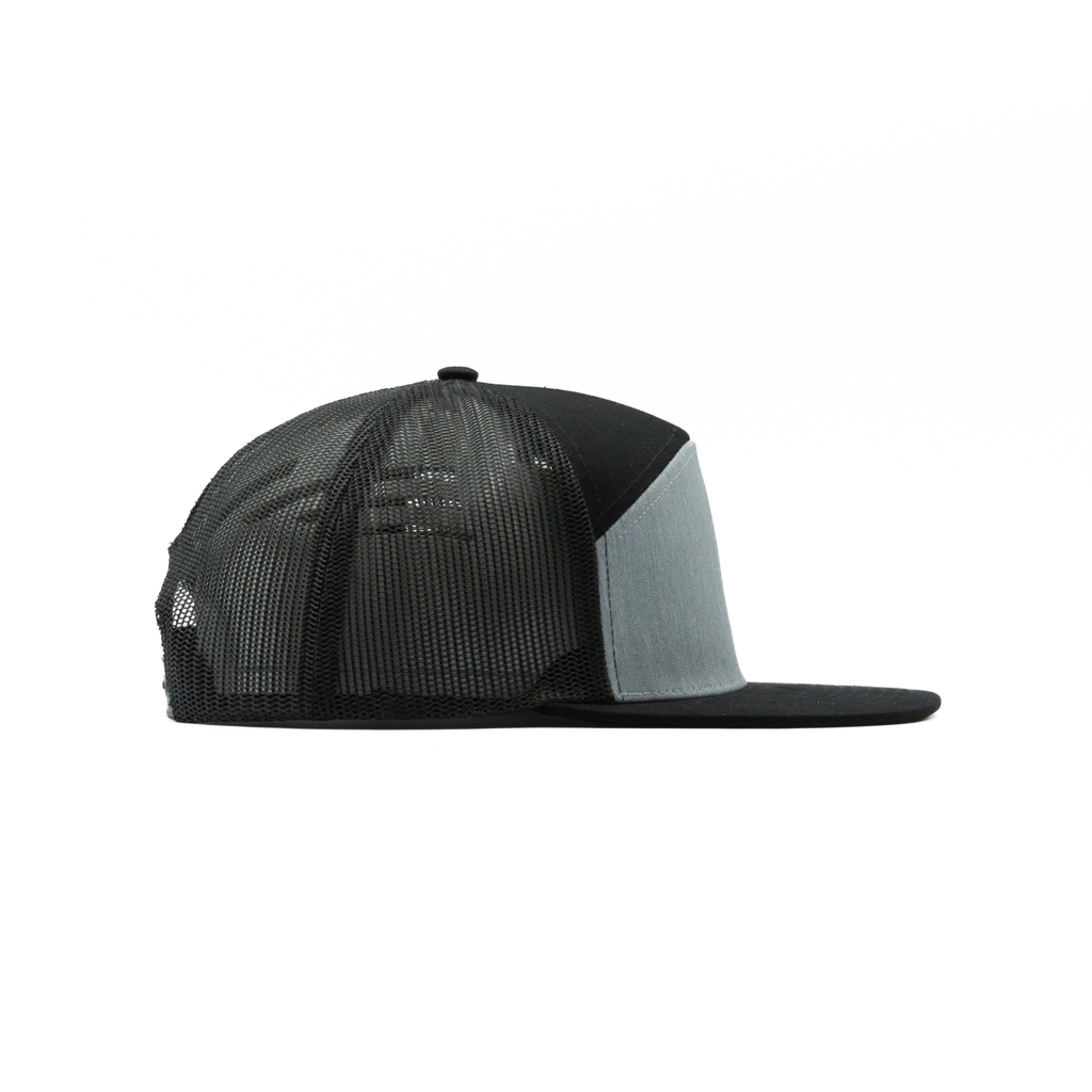 635 — 7 Panel Mesh Trucker