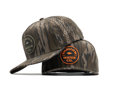 Camouflage baseball cap with 'Shallow Water Co.' logo on a white background
